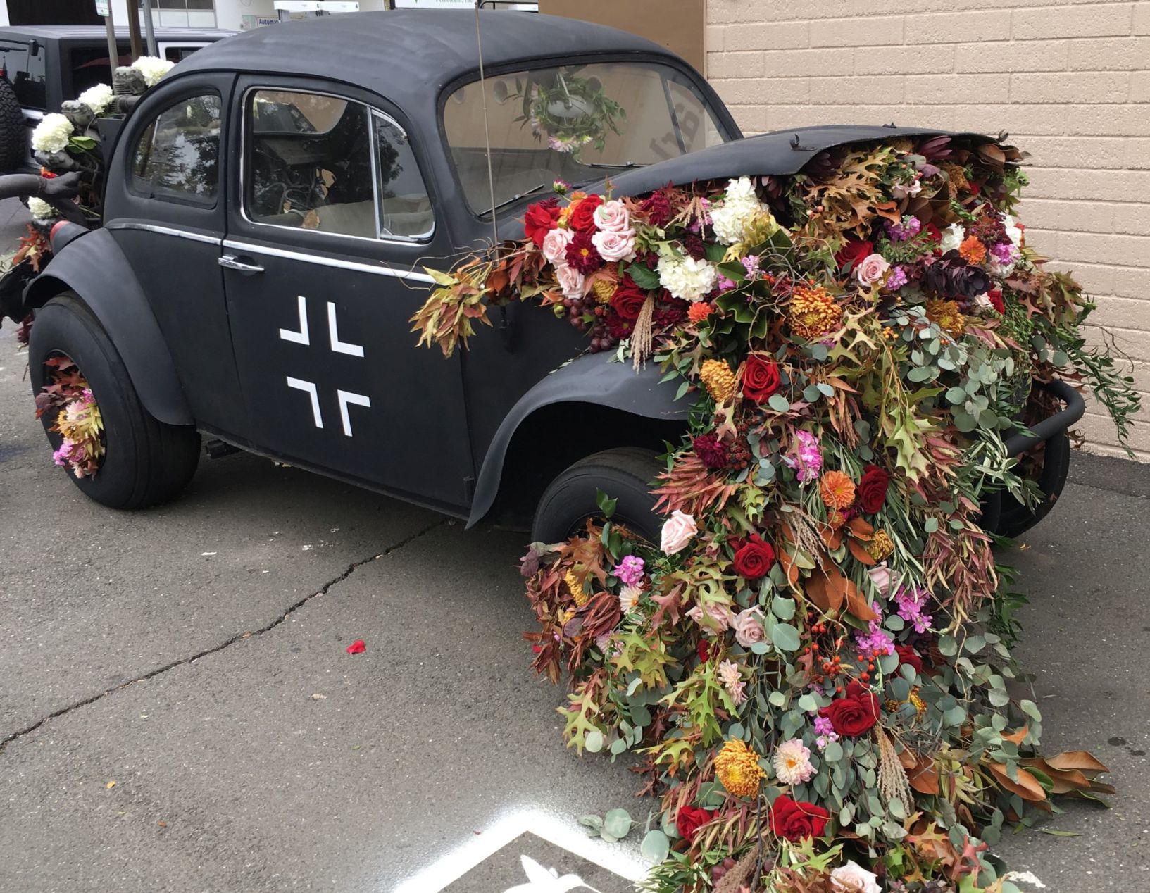 Wedding flowers recycled for VW Bug